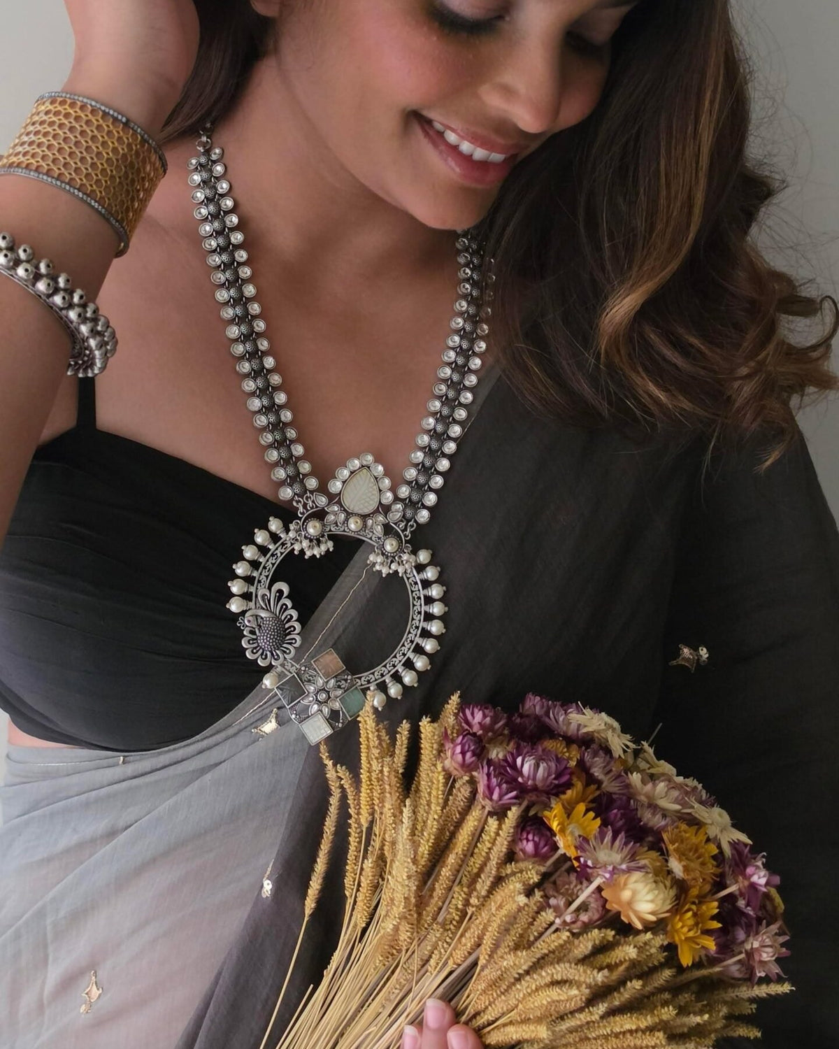 Ishita handcrafted long silver necklace, worn