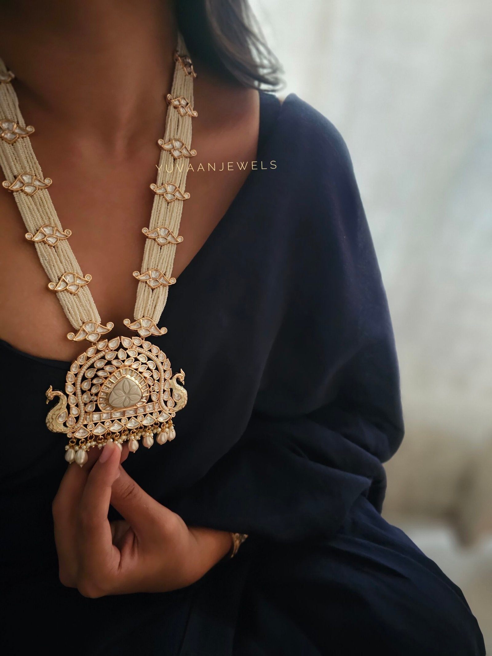 Clara peacock motif long haar