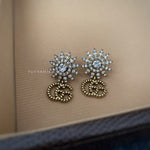 Flora Tan earrings