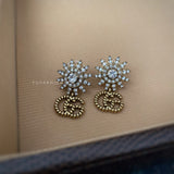 Flora Tan earrings