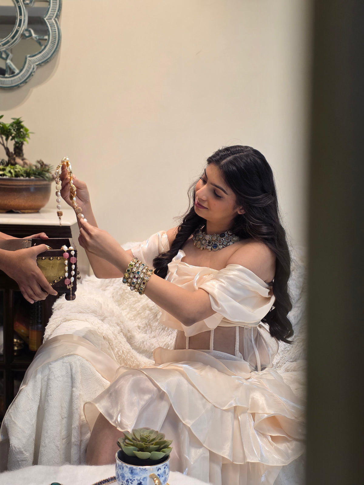 A client trying pieces at the Yuvaan studio