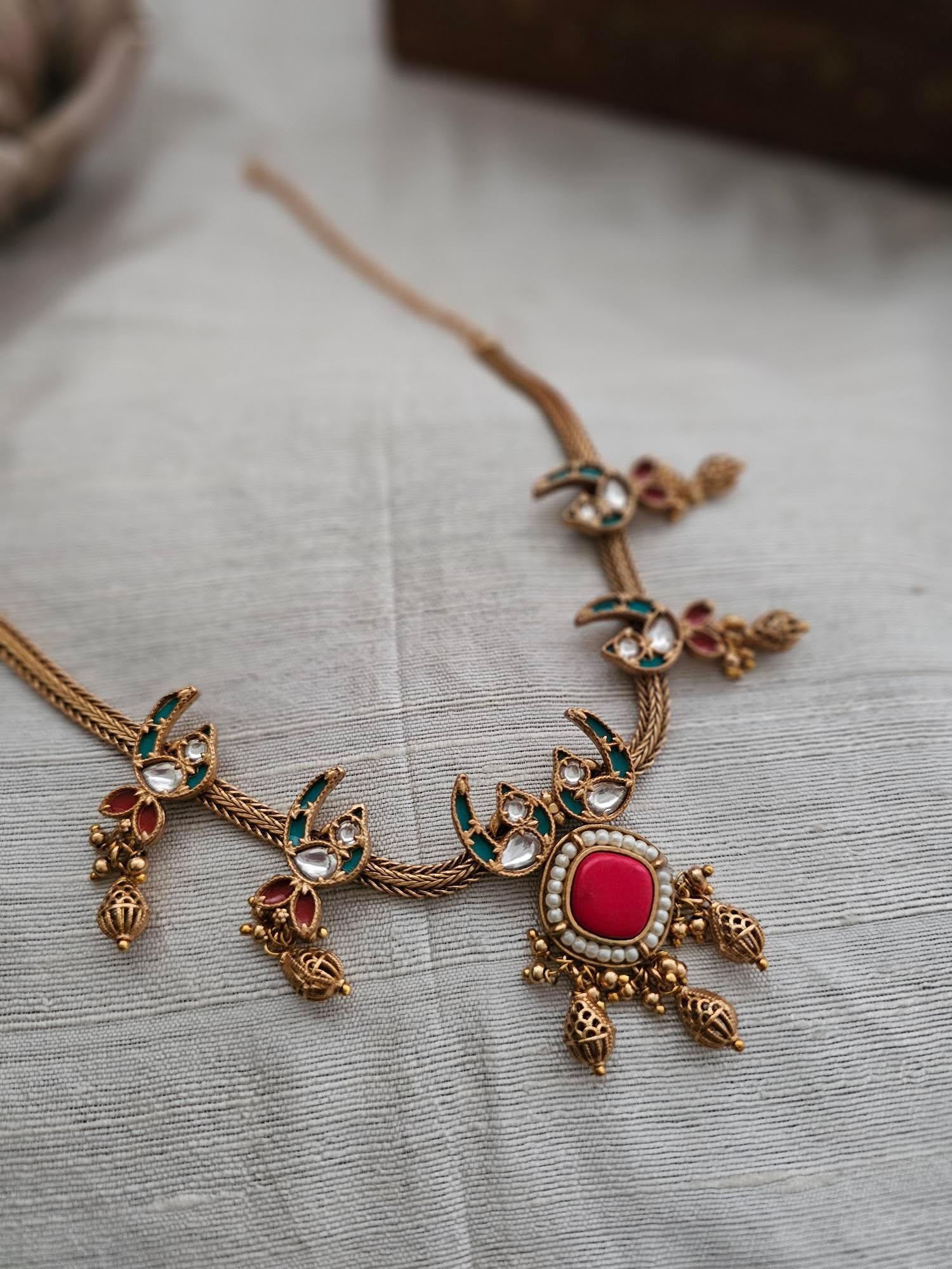 Mora handcrafted necklace with earrings Thumbnail